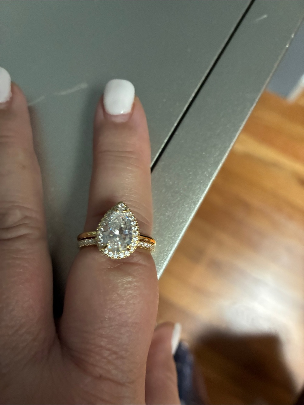 Gold Teardrop Halo Engagement Ring with Clear Center Stone